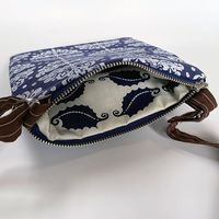 Less Is More- Ornamento in White on Blue Cross Body Bag